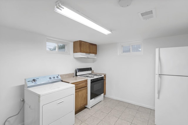 1205 N Irving Ave, Berkeley, IL 60163 - kitchen featuring white appliances, washer / clothes dryer, under cabinet range hood, brown cabinets, and light countertops
