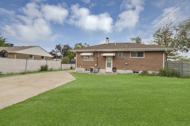 1205 N Irving Ave, Berkeley, IL 60163 - rear view of house featuring brick siding, concrete driveway, and a chimney