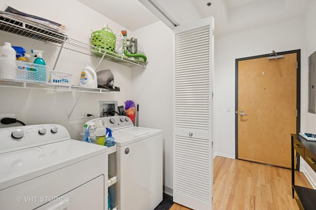 1201 W Adams St Unit 1001, Chicago, IL 60607 - laundry area with washing machine and dryer and light wood finished floors
