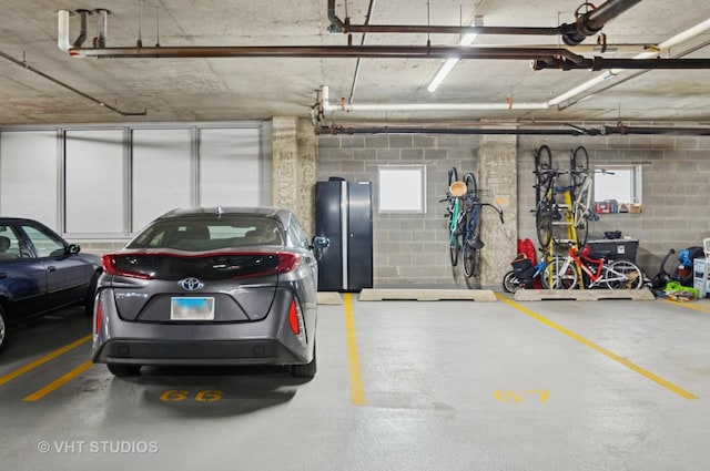 1201 W Adams St Unit 1001, Chicago, IL 60607 - parking deck featuring concrete block wall