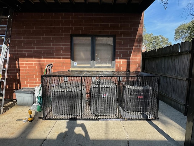 3037 W Polk Ave Unit 3, Chicago, IL 60612 - view of patio with outdoor dining area and central AC