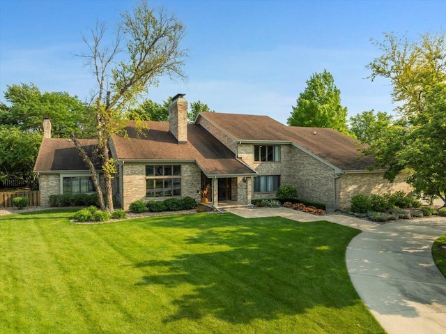 1810 Cardinal Ct, Pontiac, IL 61764 - view of front of property with stone siding and a chimney