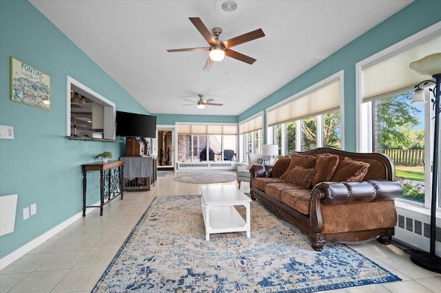 1810 Cardinal Ct, Pontiac, IL 61764 - living room with light tile patterned floors, plenty of natural light, and lofted ceiling
