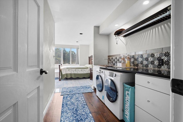 1810 Cardinal Ct, Pontiac, IL 61764 - washroom featuring washer and dryer, hardwood / wood-style flooring, and recessed lighting