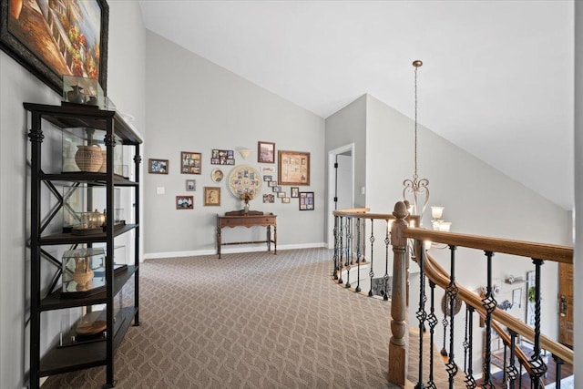1810 Cardinal Ct, Pontiac, IL 61764 - corridor with a chandelier, an upstairs landing, dark colored carpet, and high vaulted ceiling
