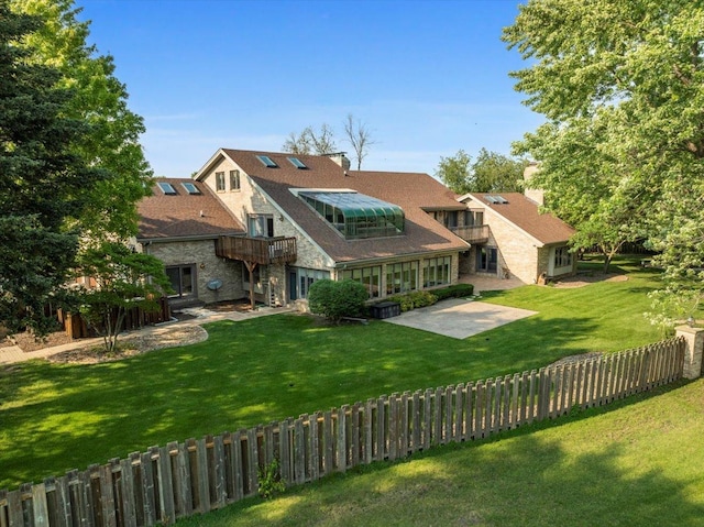 1810 Cardinal Ct, Pontiac, IL 61764 - back of property featuring stone siding and a patio