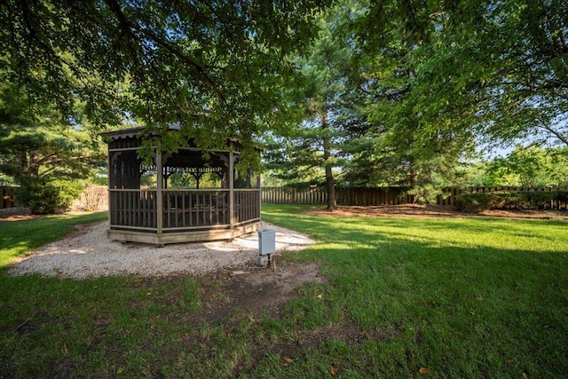 1810 Cardinal Ct, Pontiac, IL 61764 - fenced backyard with a gazebo