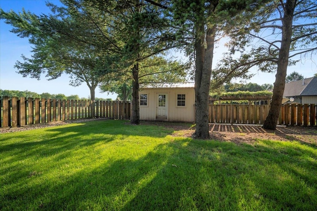 1810 Cardinal Ct, Pontiac, IL 61764 - fenced backyard featuring an outbuilding