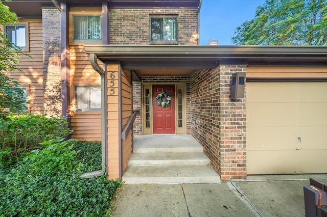 655 Waverly Dr Unit B, Elgin, IL 60120 - doorway to property featuring brick siding