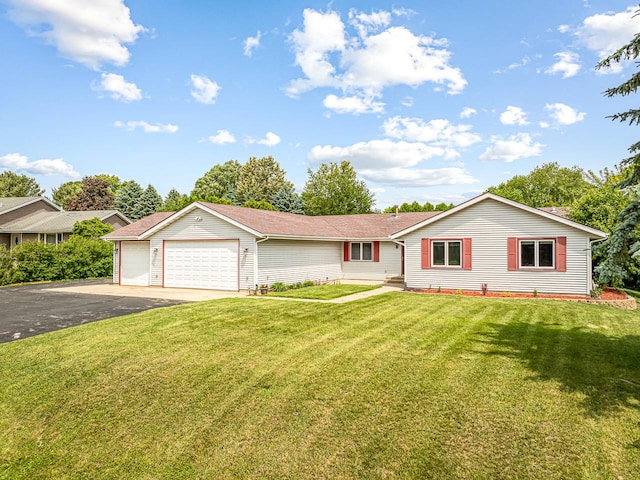 9650 Edgefield Rd, Roscoe, IL 61073 - ranch-style home featuring a garage, driveway, and a front yard