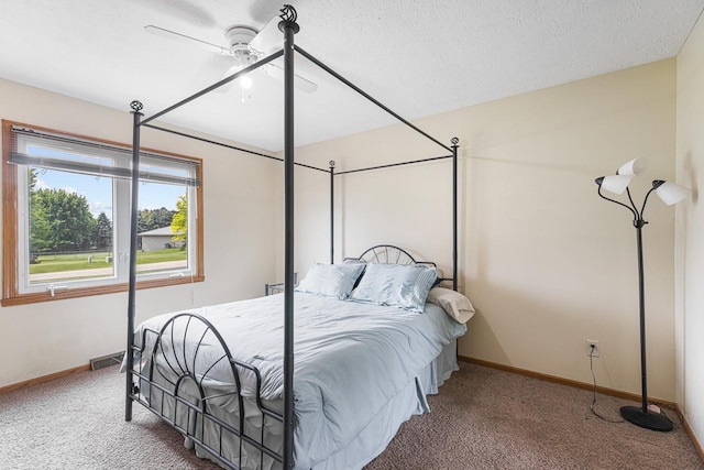 9650 Edgefield Rd, Roscoe, IL 61073 - bedroom with carpet flooring, baseboards, and a ceiling fan