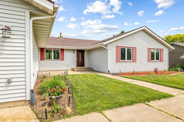 9650 Edgefield Rd, Roscoe, IL 61073 - ranch-style house featuring a front yard and roof with shingles