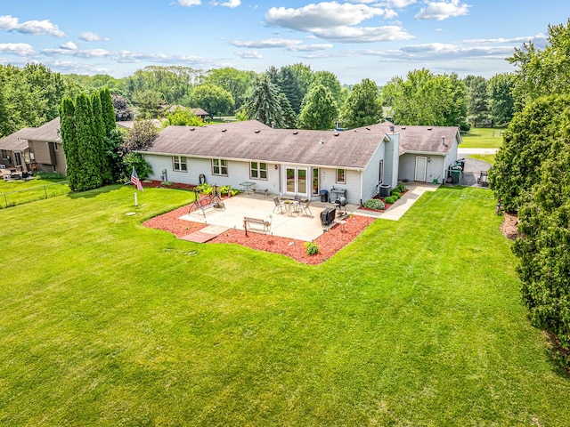 9650 Edgefield Rd, Roscoe, IL 61073 - back of property with a patio area and a shingled roof