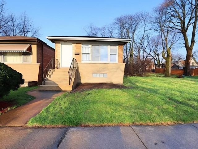 7056 S Honore St, Chicago, IL 60636 - view of front facade with a front lawn