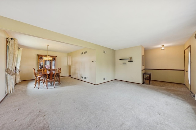13040 W Tanglewood Cir, Palos Park, IL 60464 - dining room with light carpet and a chandelier