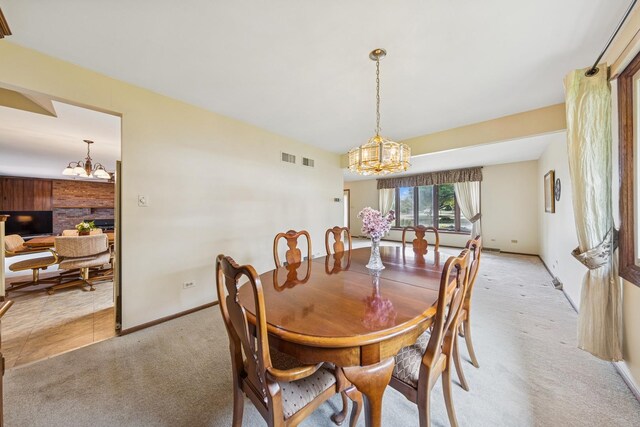 13040 W Tanglewood Cir, Palos Park, IL 60464 - dining area with a chandelier and light colored carpet