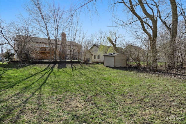 1710 Arlington Dr, Hanover Park, IL 60133 - view of green lawn featuring a deck