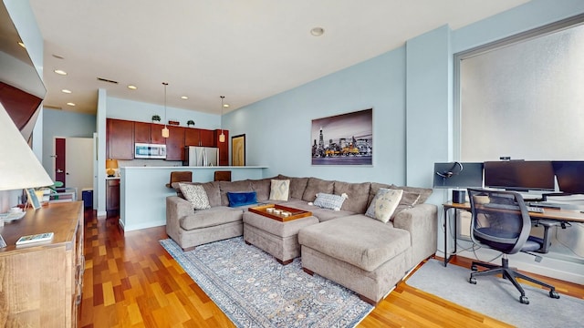 3920 N Sheridan Rd Unit 411, Chicago, IL 60613 - living area with light wood finished floors, an office area, and recessed lighting