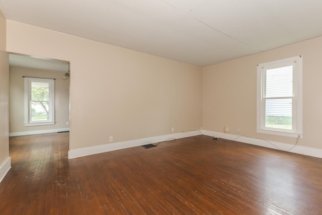 602 N Lee St, Bloomington, IL 61701 - empty room with dark wood-type flooring