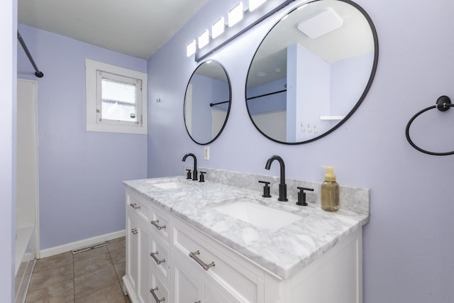 602 N Lee St, Bloomington, IL 61701 - full bathroom featuring double vanity, tile patterned flooring, and bathing tub / shower combination