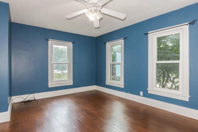 602 N Lee St, Bloomington, IL 61701 - unfurnished room with plenty of natural light, wood finished floors, and ceiling fan