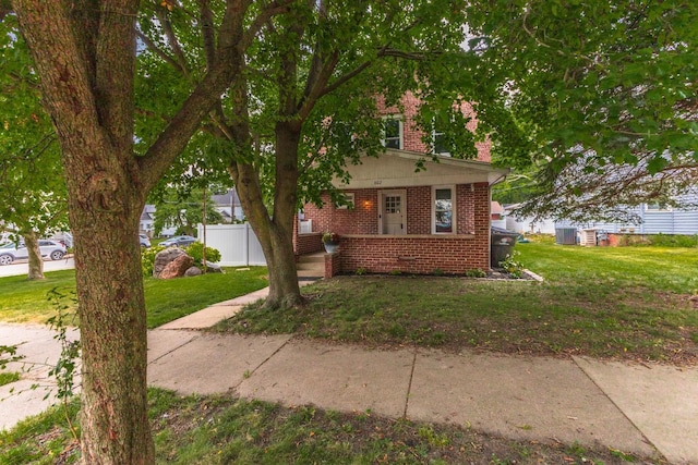 602 N Lee St, Bloomington, IL 61701 - view of front of home featuring brick siding