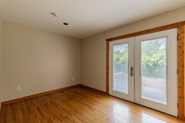 402 Lincoln St, Seatonville, IL 61359 - spare room with light wood-style floors and a smoke detector