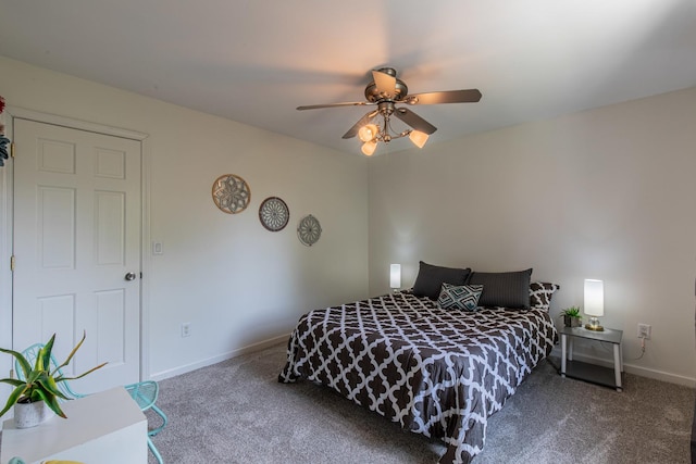 402 Lincoln St, Seatonville, IL 61359 - carpeted bedroom with baseboards and a ceiling fan