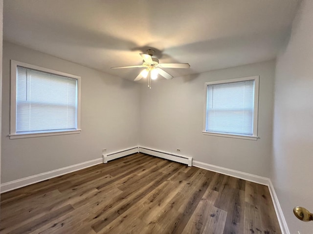 543 Geneva Ave Unit 104A, Bellwood, IL 60104 - empty room with a baseboard radiator, a ceiling fan, baseboards, and dark wood finished floors