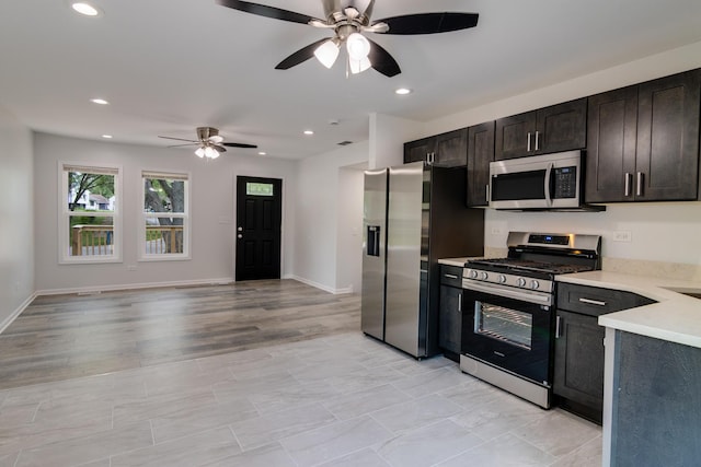 22156 Peach Tree Ave, Sauk Village, IL 60411 - kitchen with stainless steel appliances, a ceiling fan, light countertops, recessed lighting, and open floor plan