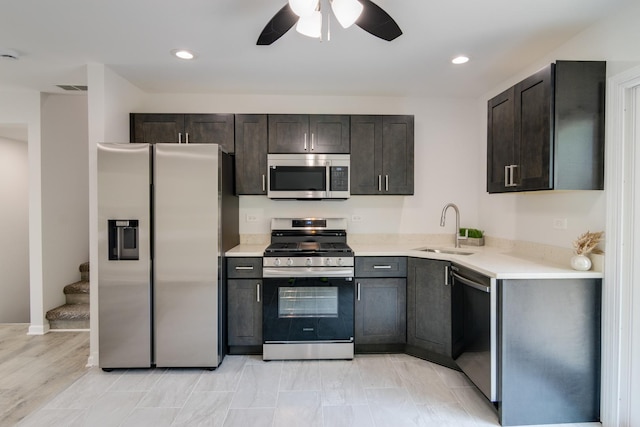22156 Peach Tree Ave, Sauk Village, IL 60411 - kitchen with stainless steel appliances, ceiling fan, light countertops, dark brown cabinetry, and recessed lighting