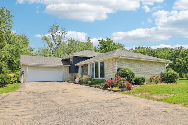 15807 W 139th St, Homer Glen, IL 60491 - tri-level home featuring brick siding, a garage, concrete driveway, and a front lawn