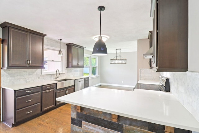 15807 W 139th St, Homer Glen, IL 60491 - kitchen featuring range with electric cooktop, dark brown cabinets, decorative backsplash, and light countertops
