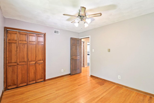 15807 W 139th St, Homer Glen, IL 60491 - unfurnished bedroom featuring light wood-type flooring, ceiling fan, and a closet