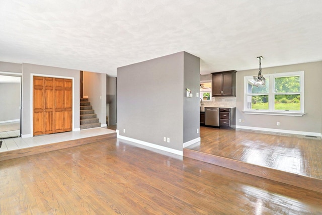 15807 W 139th St, Homer Glen, IL 60491 - unfurnished living room featuring wood finished floors and stairway