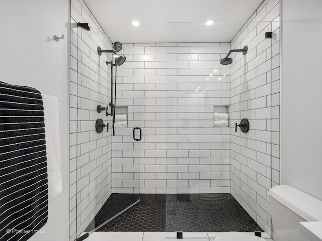 1040 W Adams St Unit 238, Chicago, IL 60607 - bathroom with a shower stall, toilet, and recessed lighting