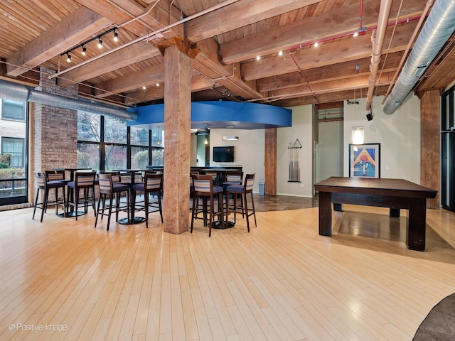 1040 W Adams St Unit 238, Chicago, IL 60607 - bar area with track lighting, wood ceiling with exposed beams, wood-type flooring, and baseboards