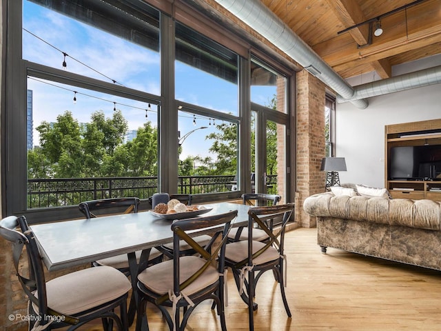1040 W Adams St Unit 238, Chicago, IL 60607 - dining space with wooden ceiling and light wood-style floors