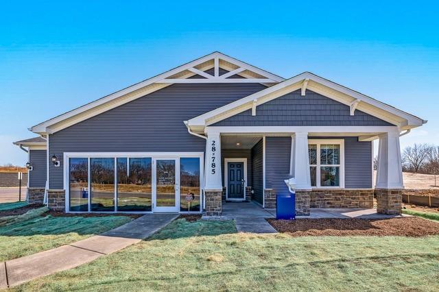 2804 Autumn Ridge Ct, Lindenhurst, IL 60046 - craftsman-style home featuring stone siding, a front yard, and a porch