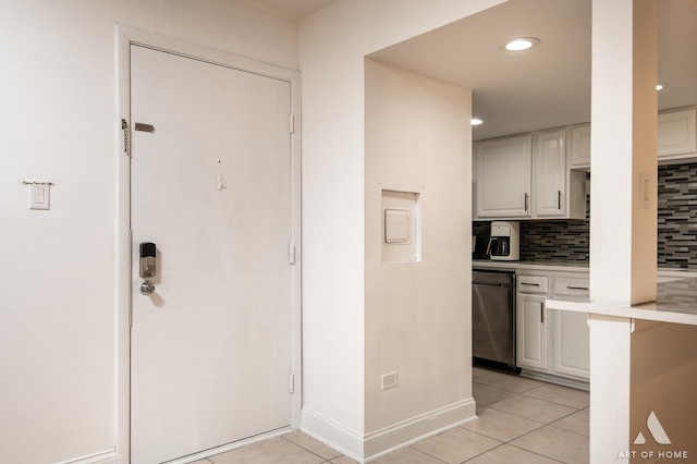 9146 W 140th St Unit 2Sw, Orland Park, IL 60462 - kitchen with dishwasher, light countertops, decorative backsplash, light tile patterned flooring, and recessed lighting
