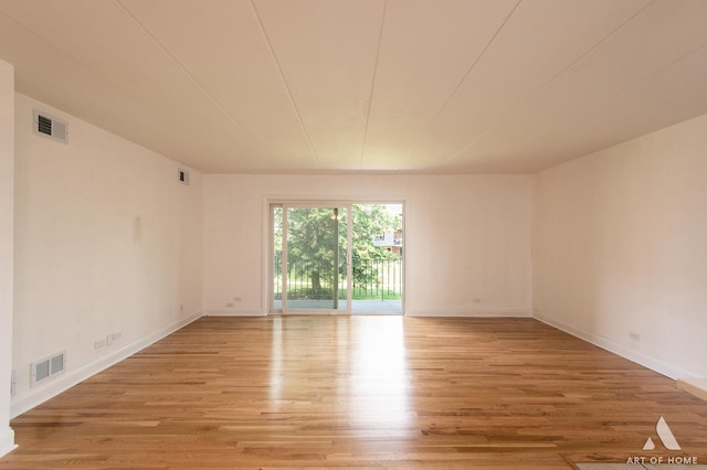 9146 W 140th St Unit 2Sw, Orland Park, IL 60462 - unfurnished room with light wood finished floors and baseboards