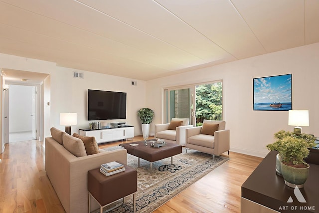 9146 W 140th St Unit 2Sw, Orland Park, IL 60462 - living room featuring light wood-style flooring and baseboards