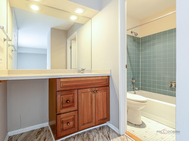 500 W Huntington Commons Rd Unit 150, Mount Prospect, IL 60056 - bathroom with vanity, tub / shower combination, and recessed lighting
