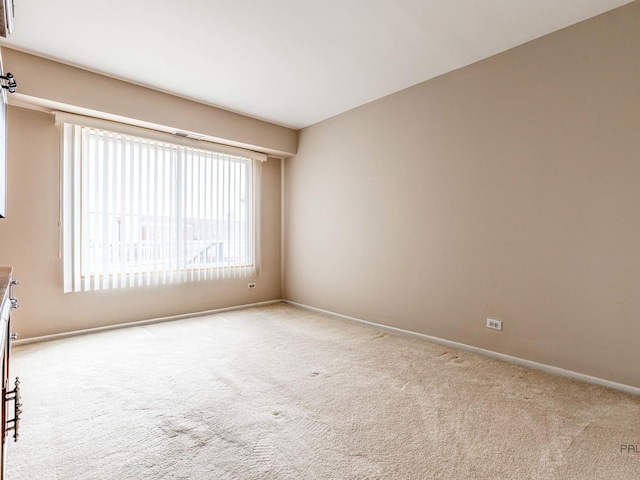 500 W Huntington Commons Rd Unit 150, Mount Prospect, IL 60056 - unfurnished room with carpet floors