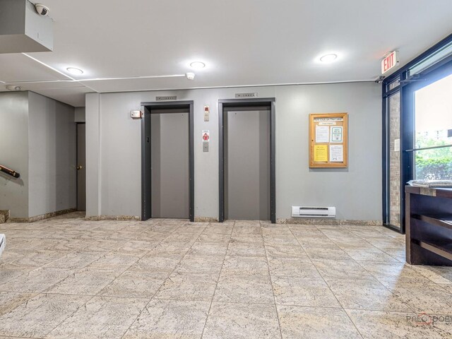 500 W Huntington Commons Rd Unit 150, Mount Prospect, IL 60056 - lobby with a surveillance system