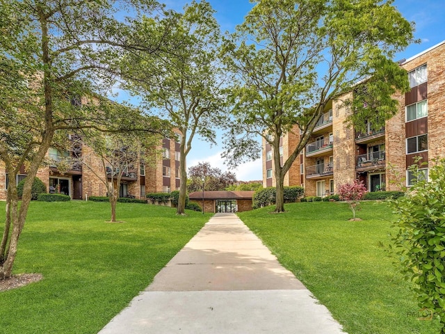 500 W Huntington Commons Rd Unit 150, Mount Prospect, IL 60056 - view of community featuring a lawn