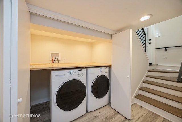 729 N Cuyler Ave, Oak Park, IL 60302 - laundry room featuring washing machine and clothes dryer and light wood-style flooring