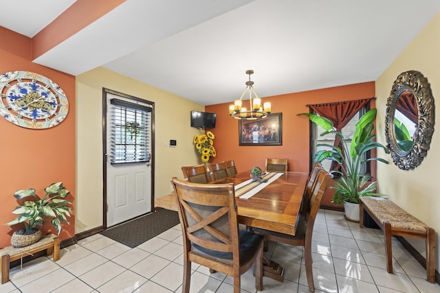 5520 S Kildare Ave, Chicago, IL 60629 - dining area featuring a chandelier and light tile patterned floors