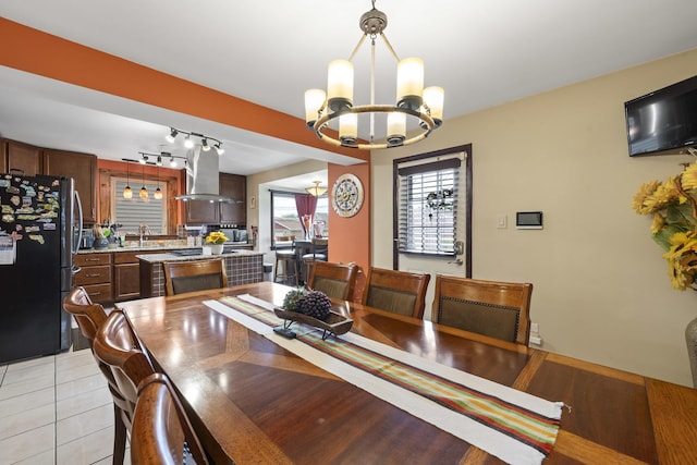 5520 S Kildare Ave, Chicago, IL 60629 - dining area with a chandelier, track lighting, and light tile patterned flooring