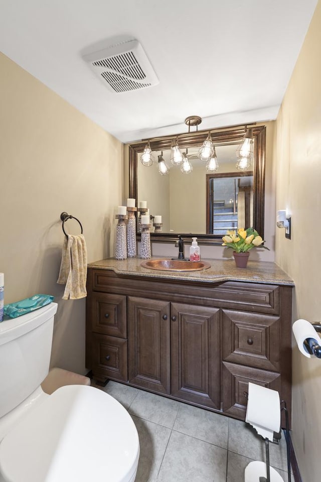 5520 S Kildare Ave, Chicago, IL 60629 - half bathroom with vanity and tile patterned flooring
